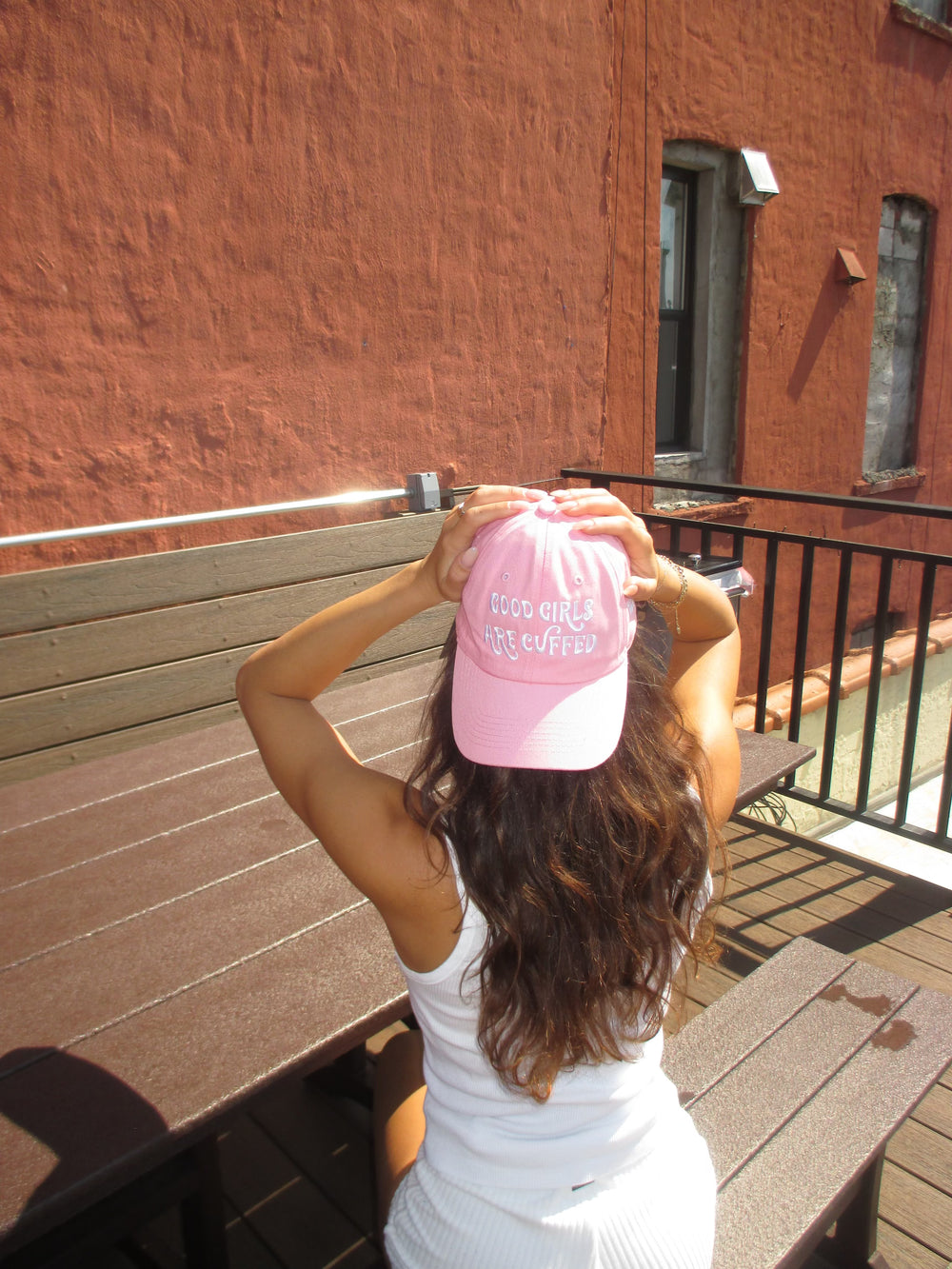 GOOD GIRLS ARE CUFFED DAD CAP - PINK