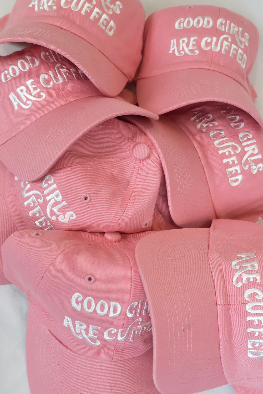 GOOD GIRLS ARE CUFFED DAD CAP - PINK